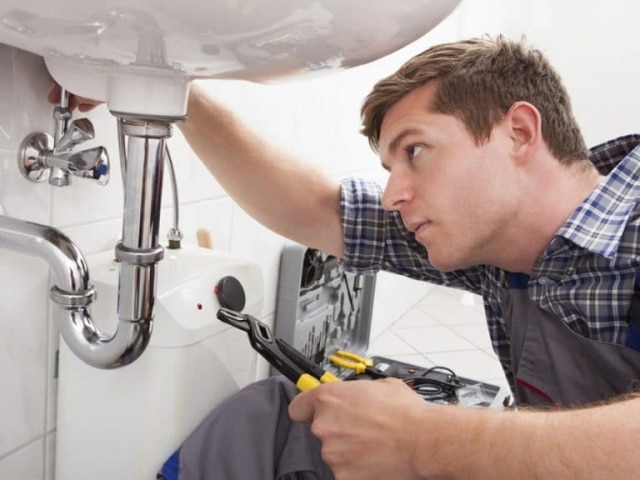 Plumber attending a plumbing emergency ealing Plumber attending a plumbing emergency ealing